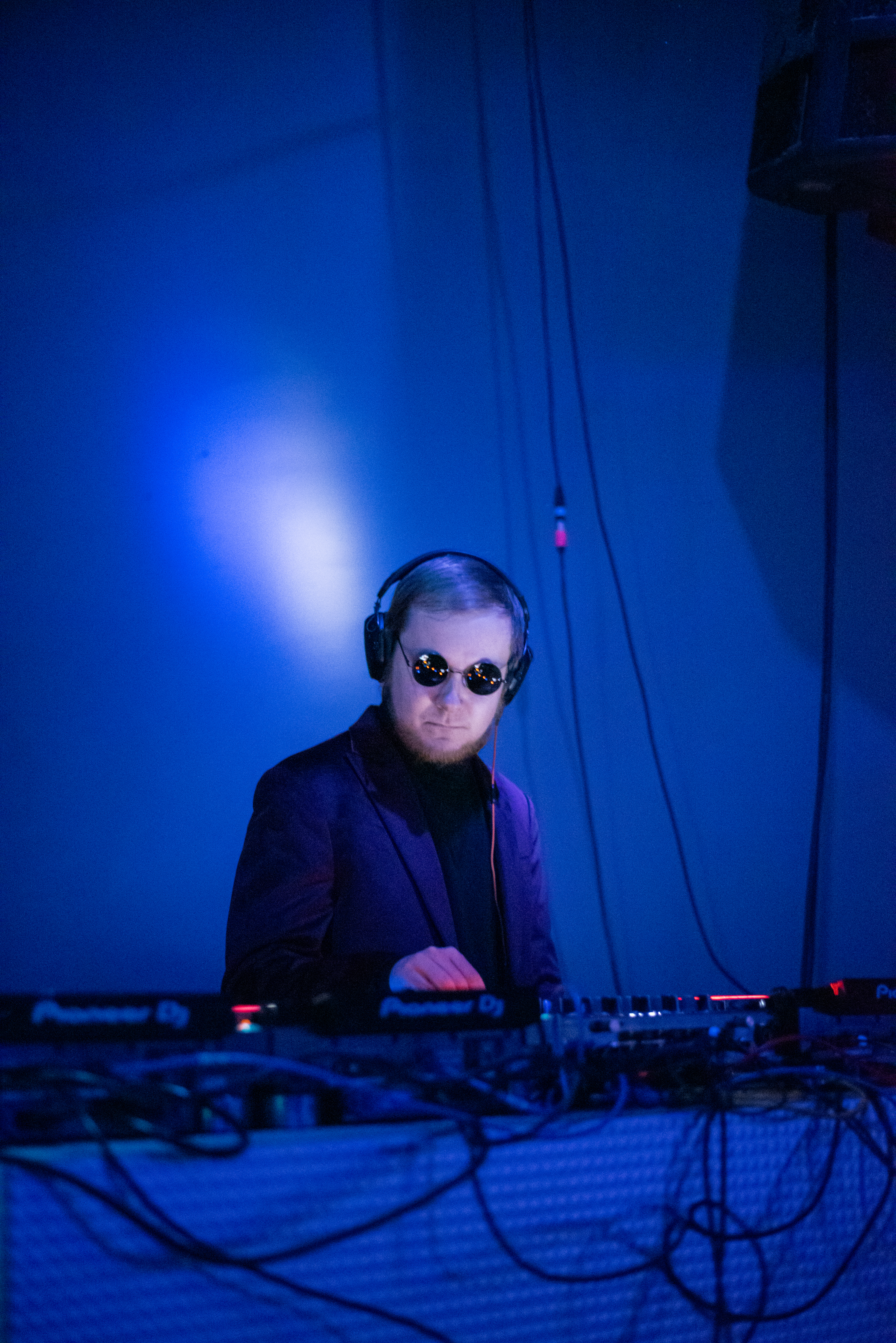 Candid moment between performers during rehearsal photographed naturally