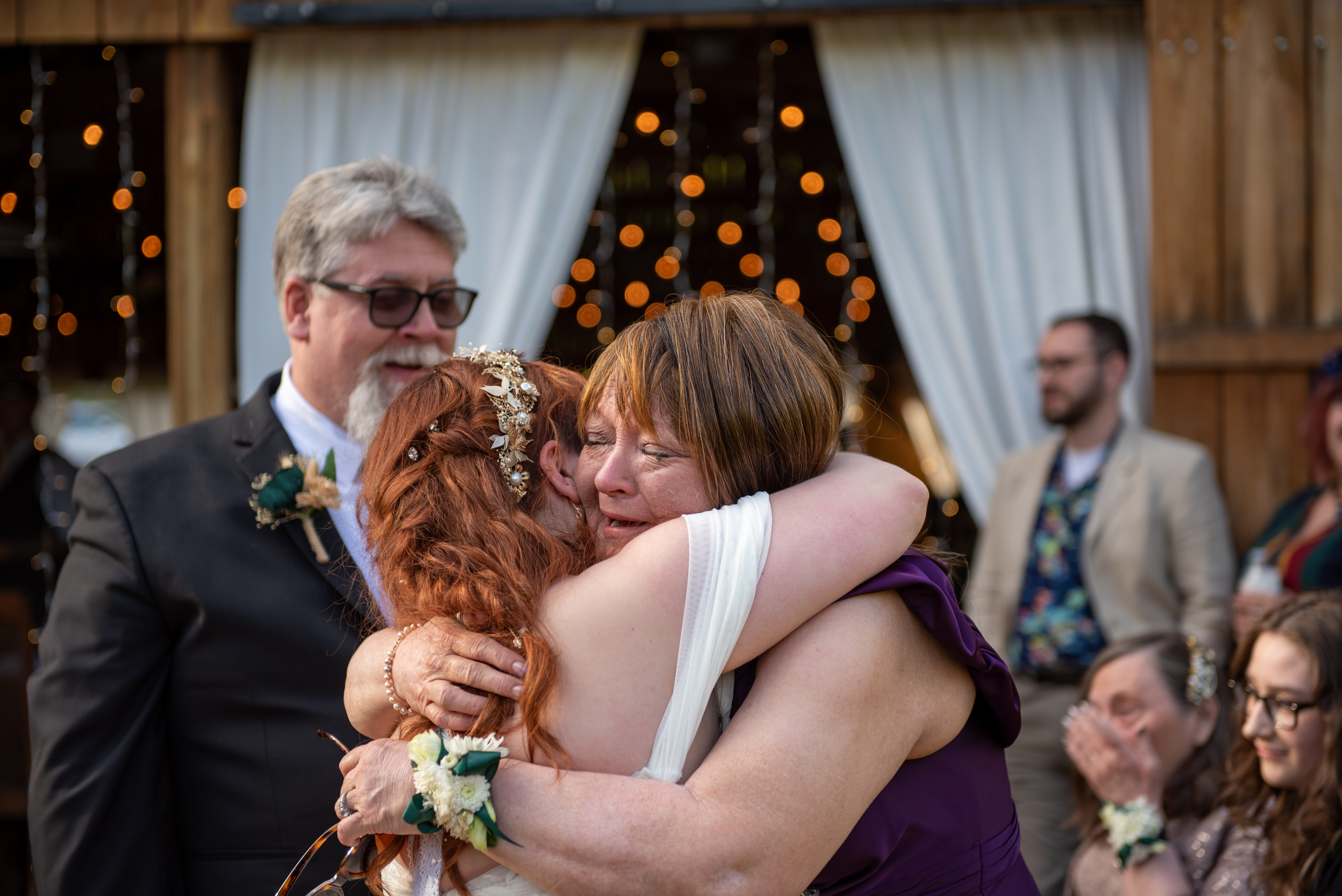 Golden hour walk with bride and groom at outdoor wedding venue