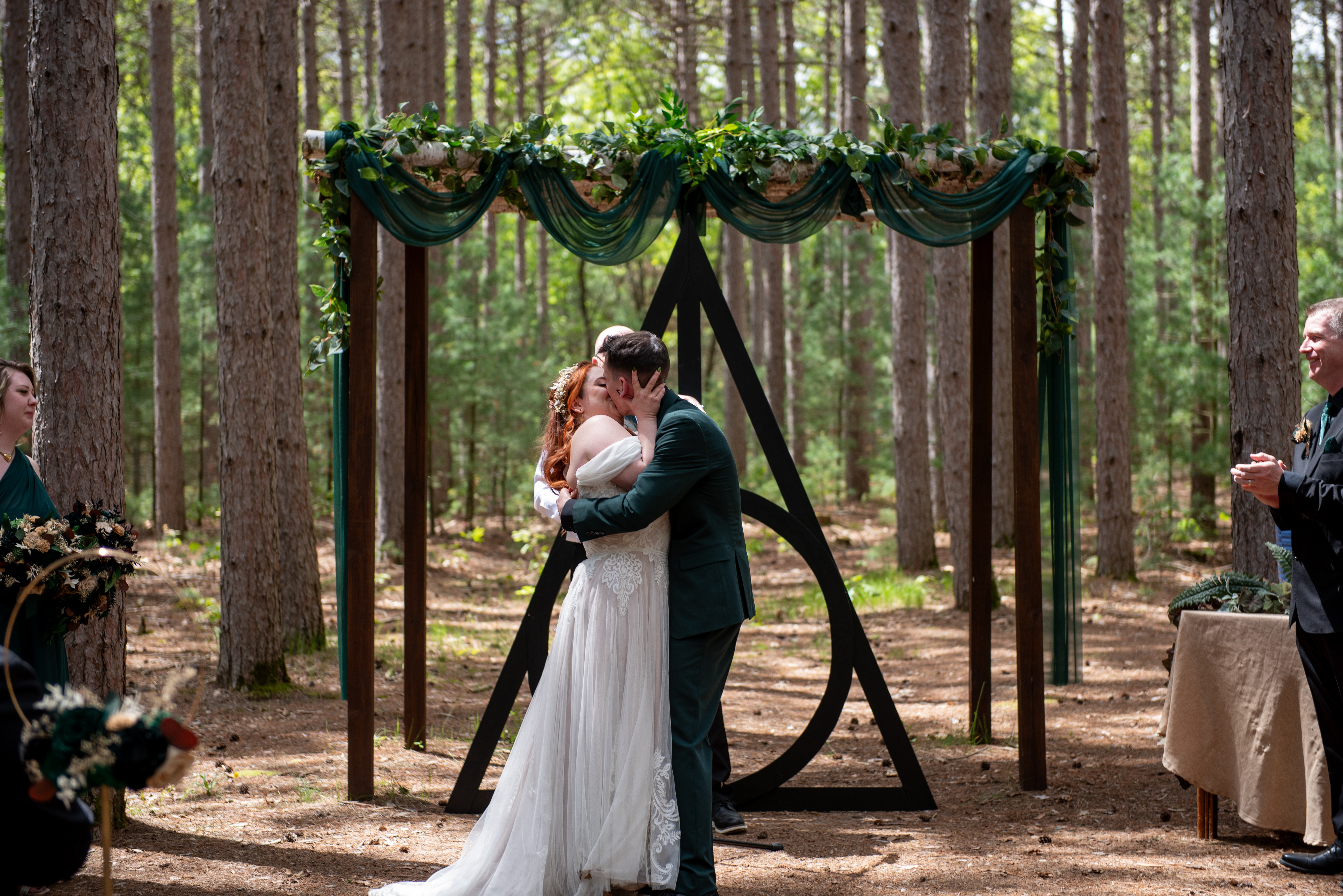 Wedding party portrait captured naturally in warm sunset light