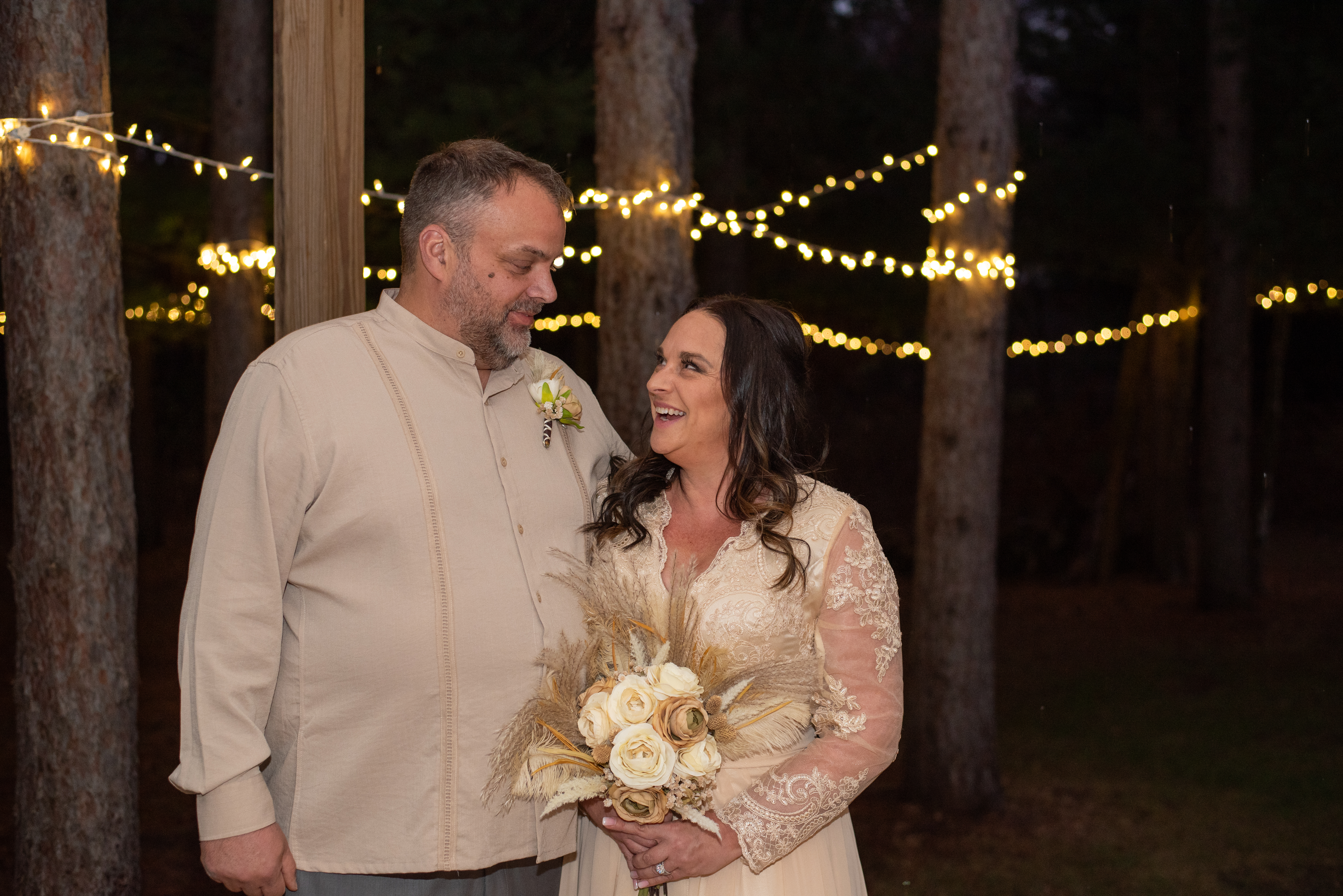 Bride and groom first look photographed in golden hour glow