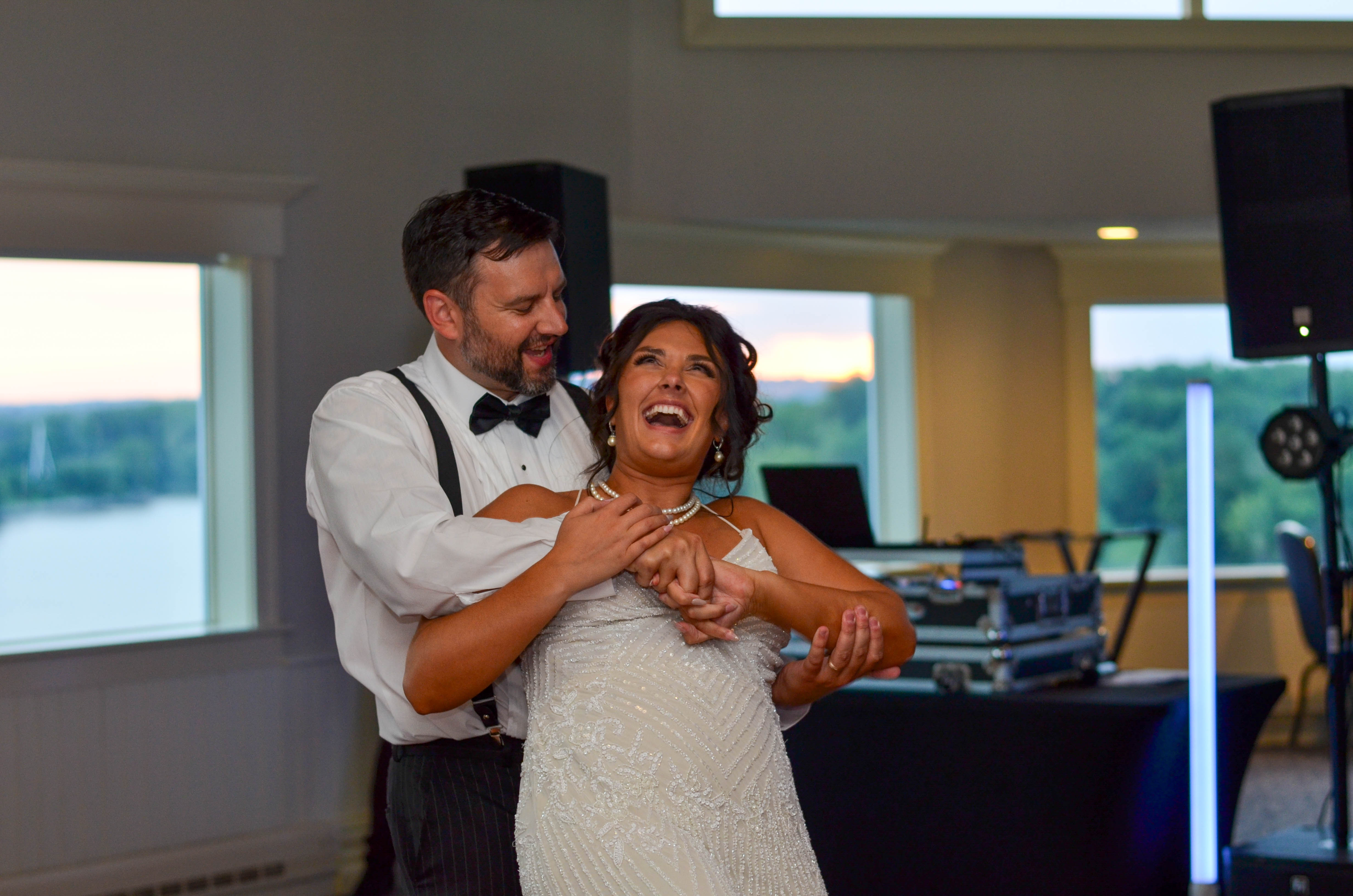 Couple portrait with warm golden hour sky in Wisconsin