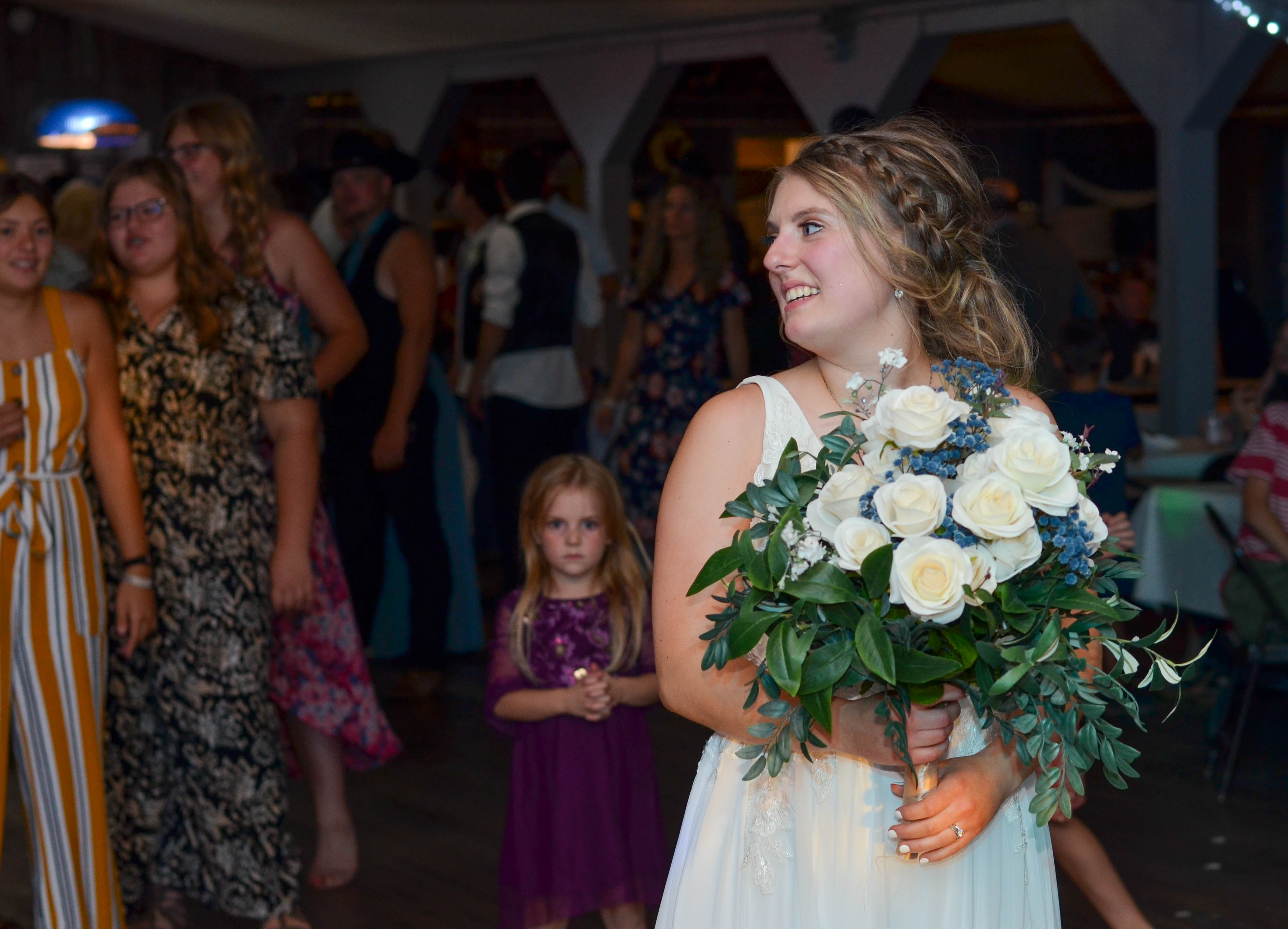 Outdoor wedding kiss captured by Wisconsin photographer in soft sunset light